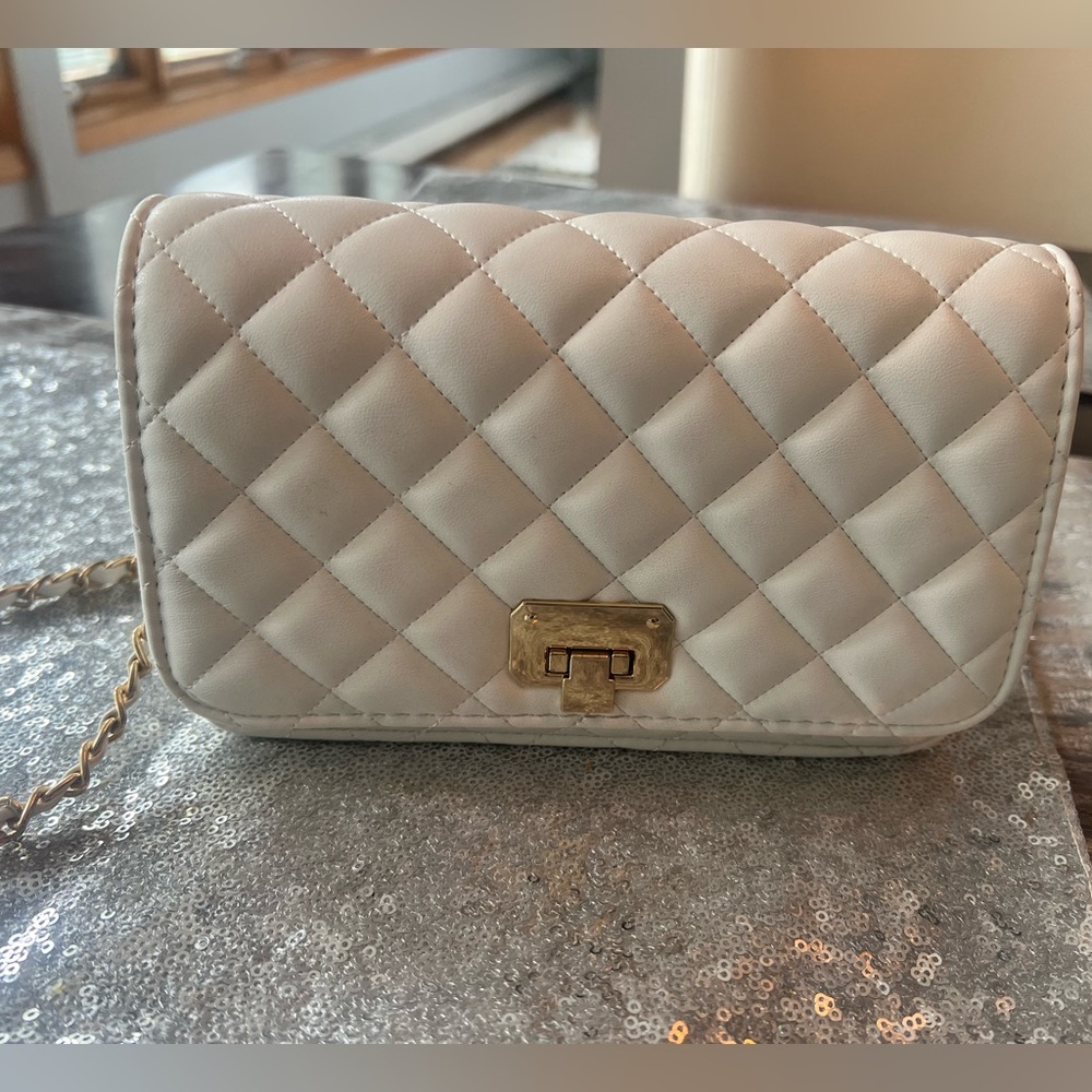 Small white quilted style bag